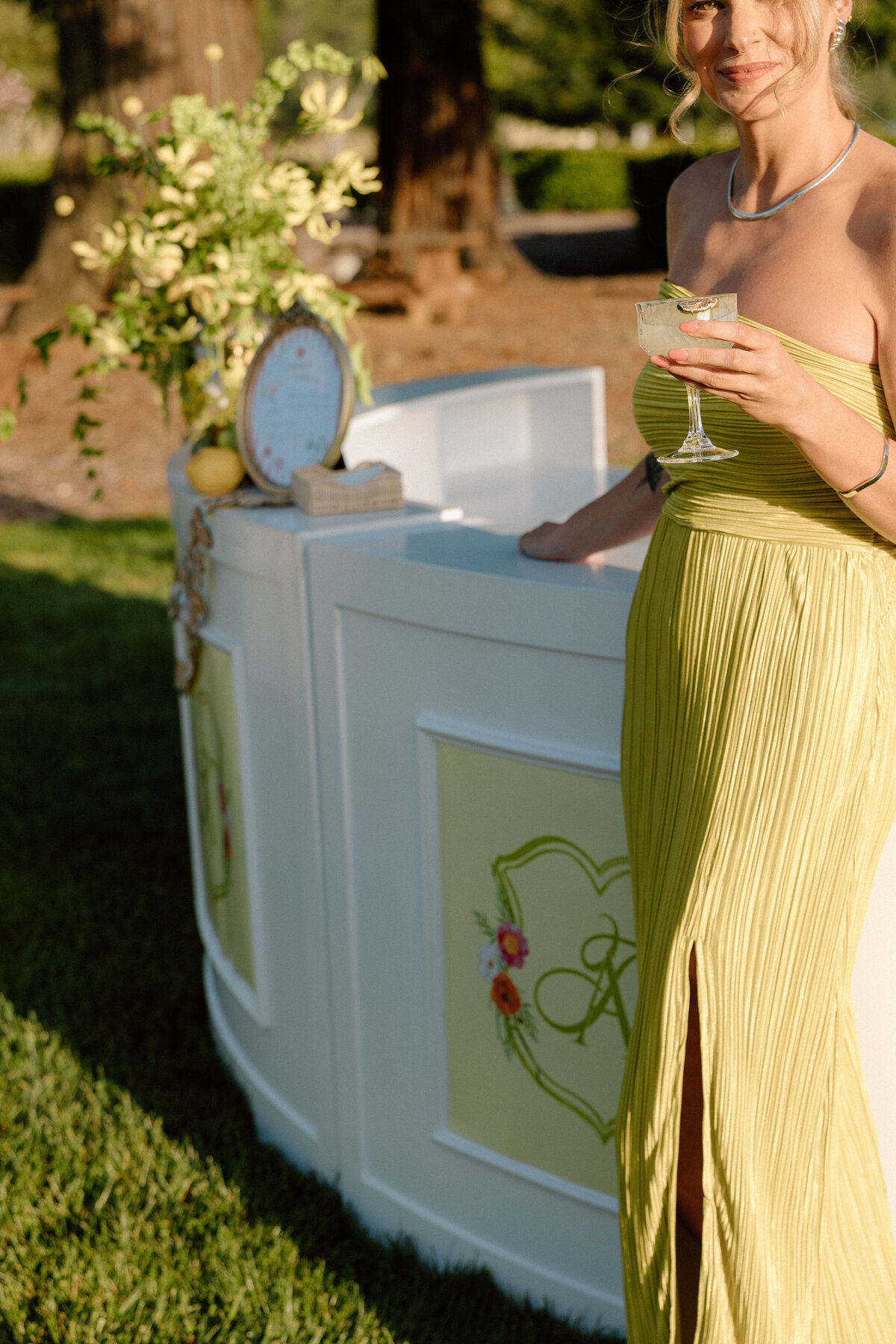 green-dress-at-bar