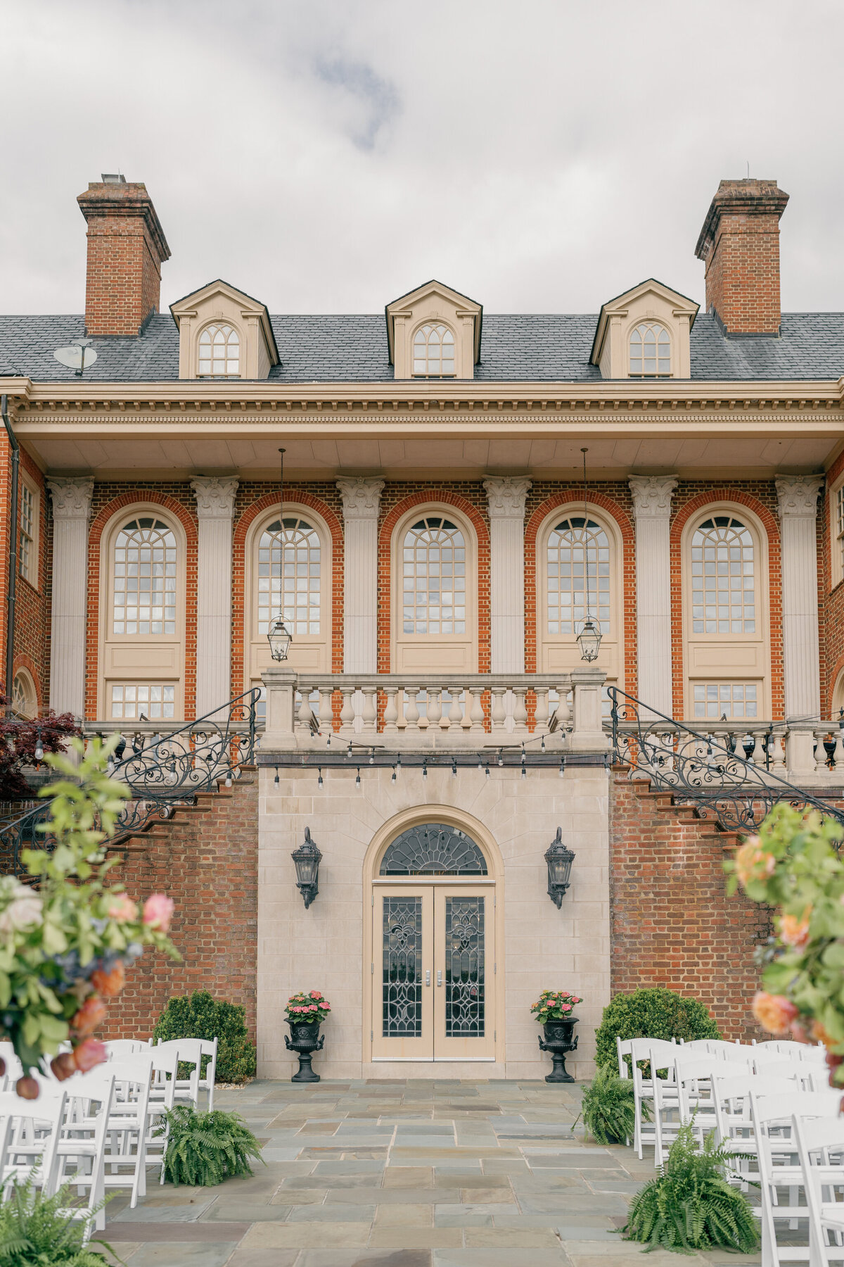 Wedding at the Estate at River Run in Maidens, VA | Wedding Photographer in Richmond | colorful ceremony decor on the Bluestone Terrace at the Estate at River Run in Richmond