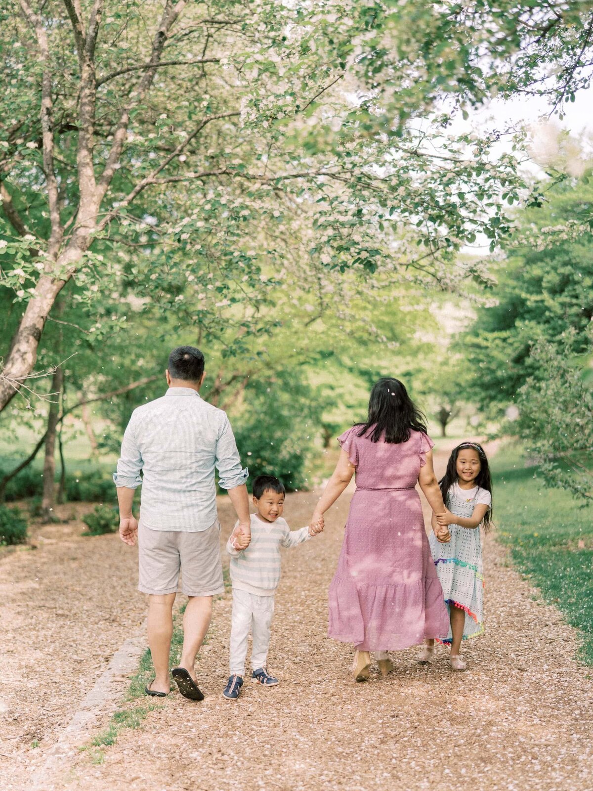 Family walking holding hands