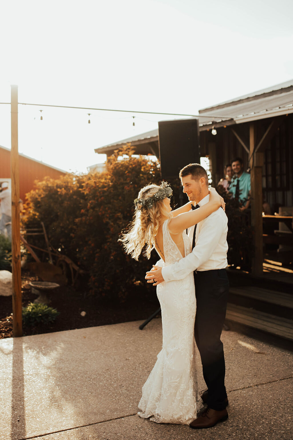 bride and groom have their first dance at their Michigan wedding venue