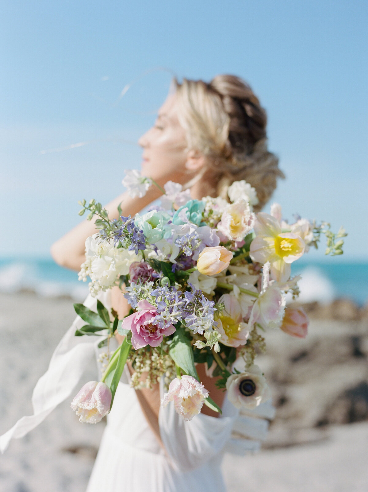 Bride shows off her MitS bouquet.