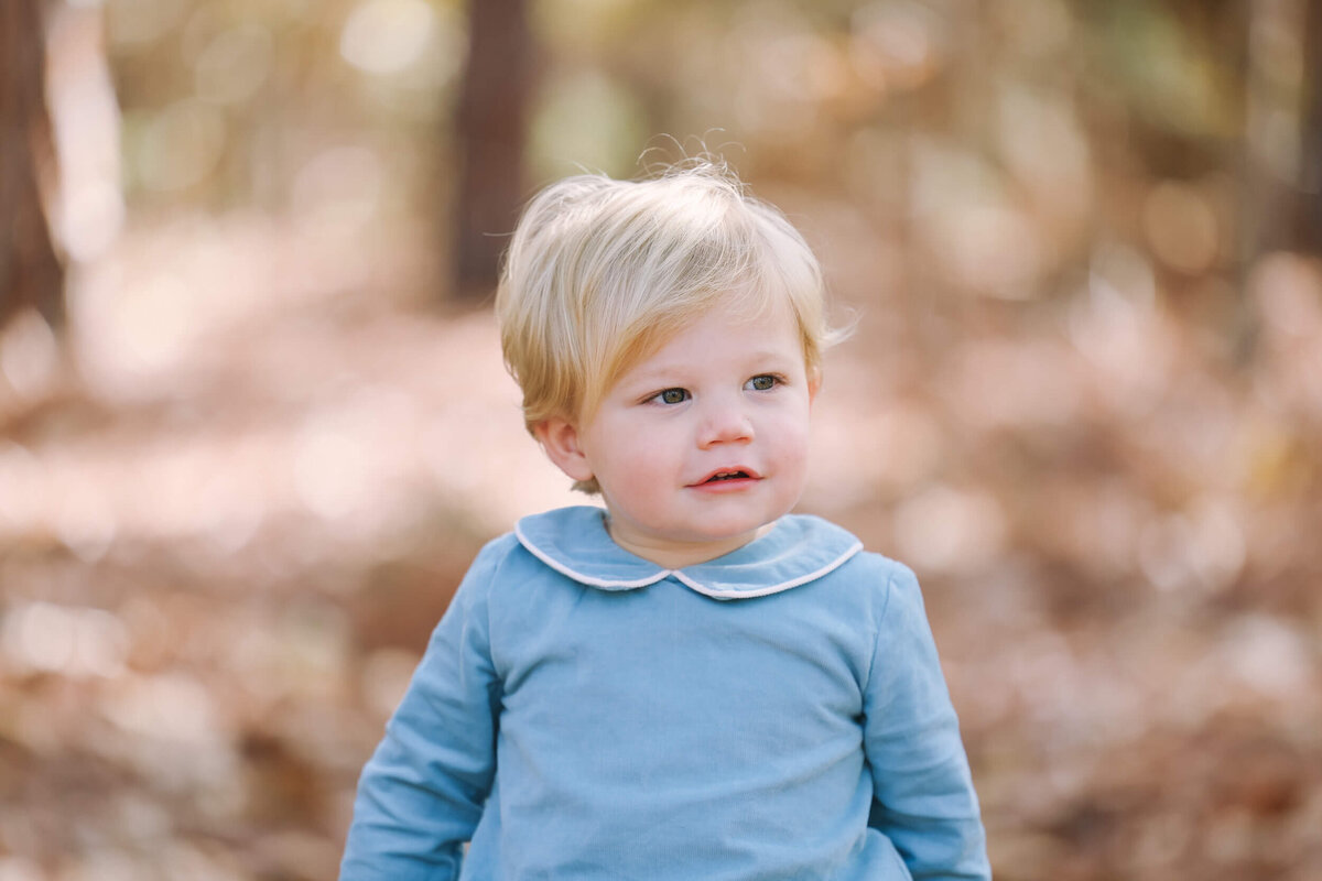 toddler-standing-in-woods-2