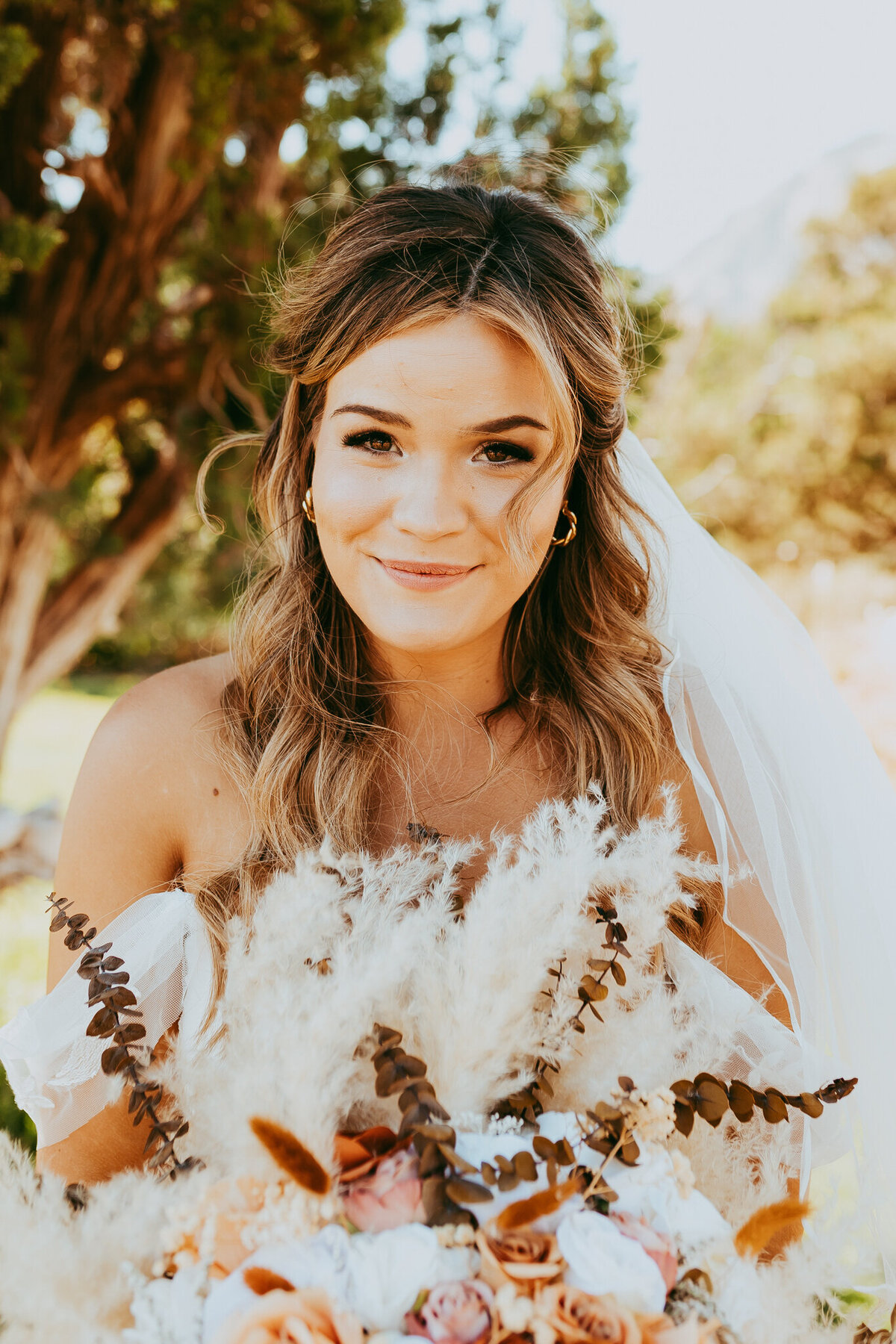 bride smiling at camera for bridal photos