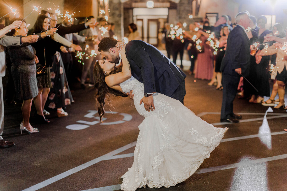 Magical sparkler send-off Piazza Messina, Cottleville, MO - captured by Style & Grace Photography in St. Louis, MO, as the couple exits their wedding reception surrounded by glowing lights and joyful guests.