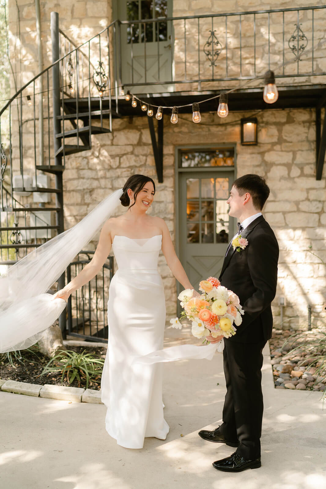 first look while the wind catches her veil