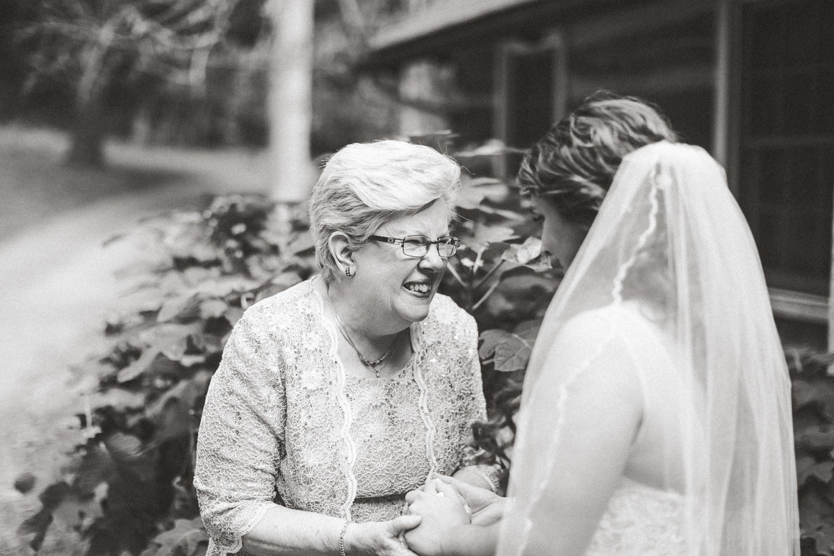 Black and white photo of bride and mother