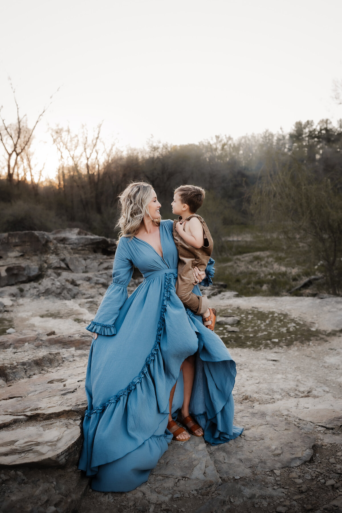 mother and young boy dancing