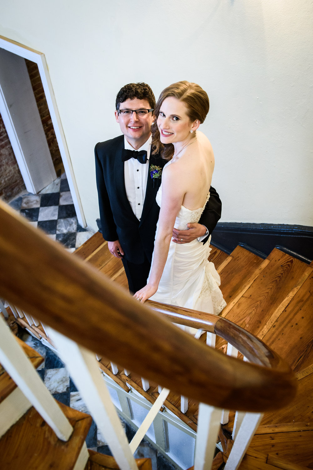 Bride and groom on stairs