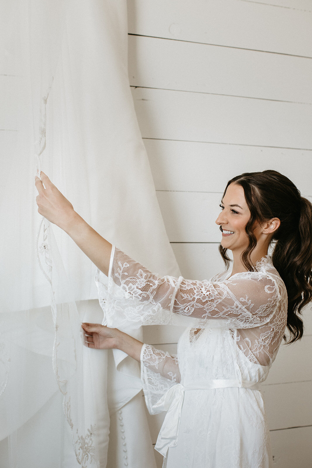 Bride with natural glam makeup and soft wedding updo in Madison, WI. Bridal hair and makeup services.