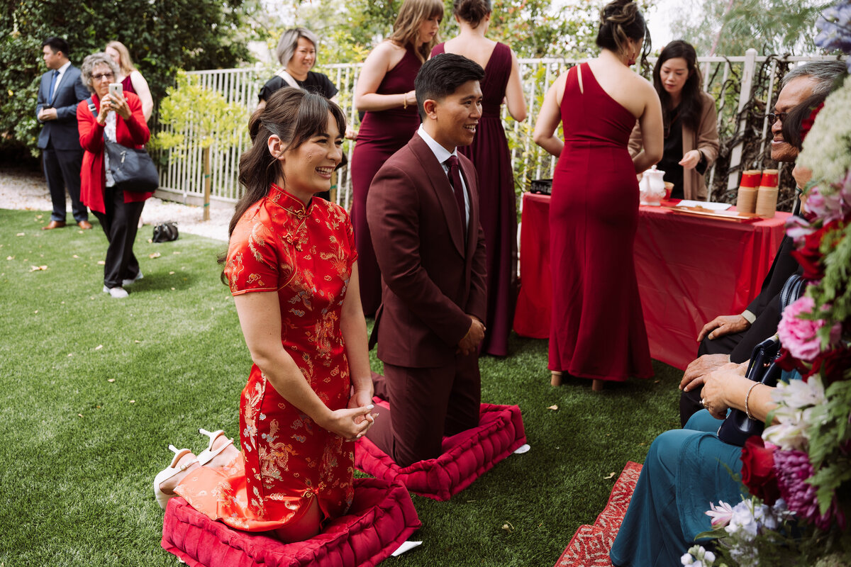 asian wedding couple partaking in ceremony
