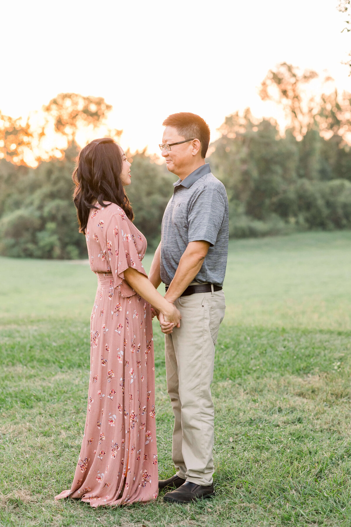 a husband and wife holding hands