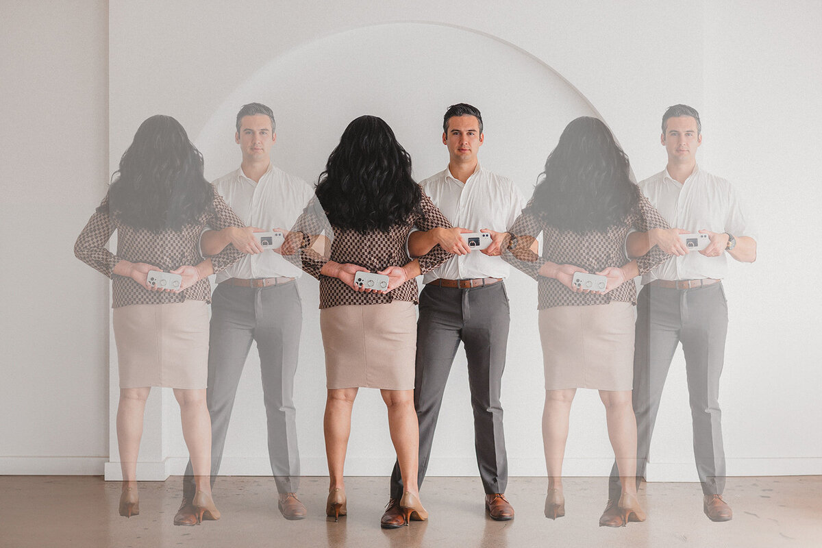 Two people stand in opposite directions
