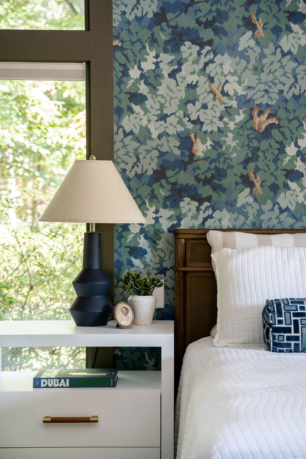 sweet southern home mid mod dark blue accent lamp on white table in bedroom