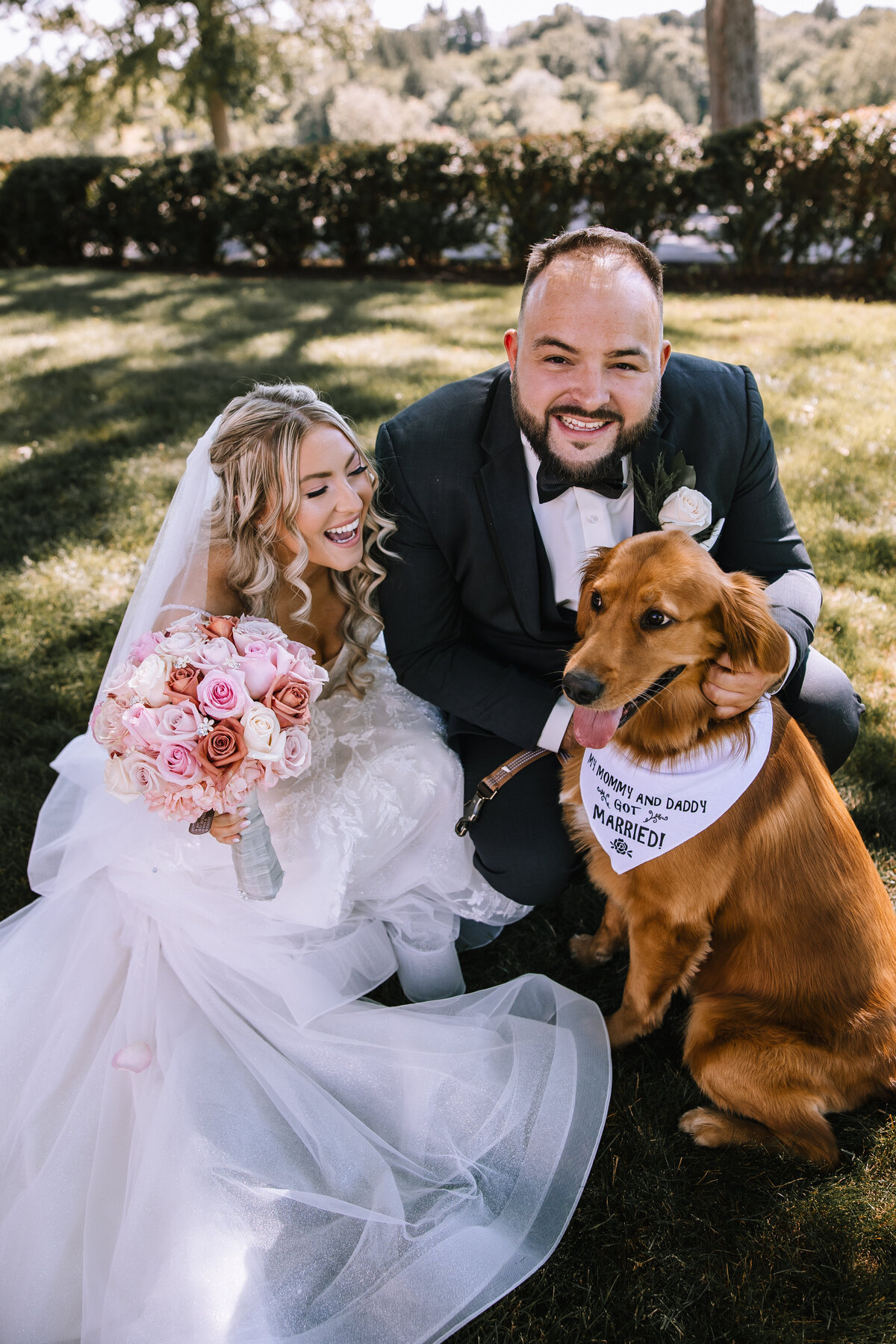 Bride and groom with their dog at their Montour Heights Country Club wedding.
