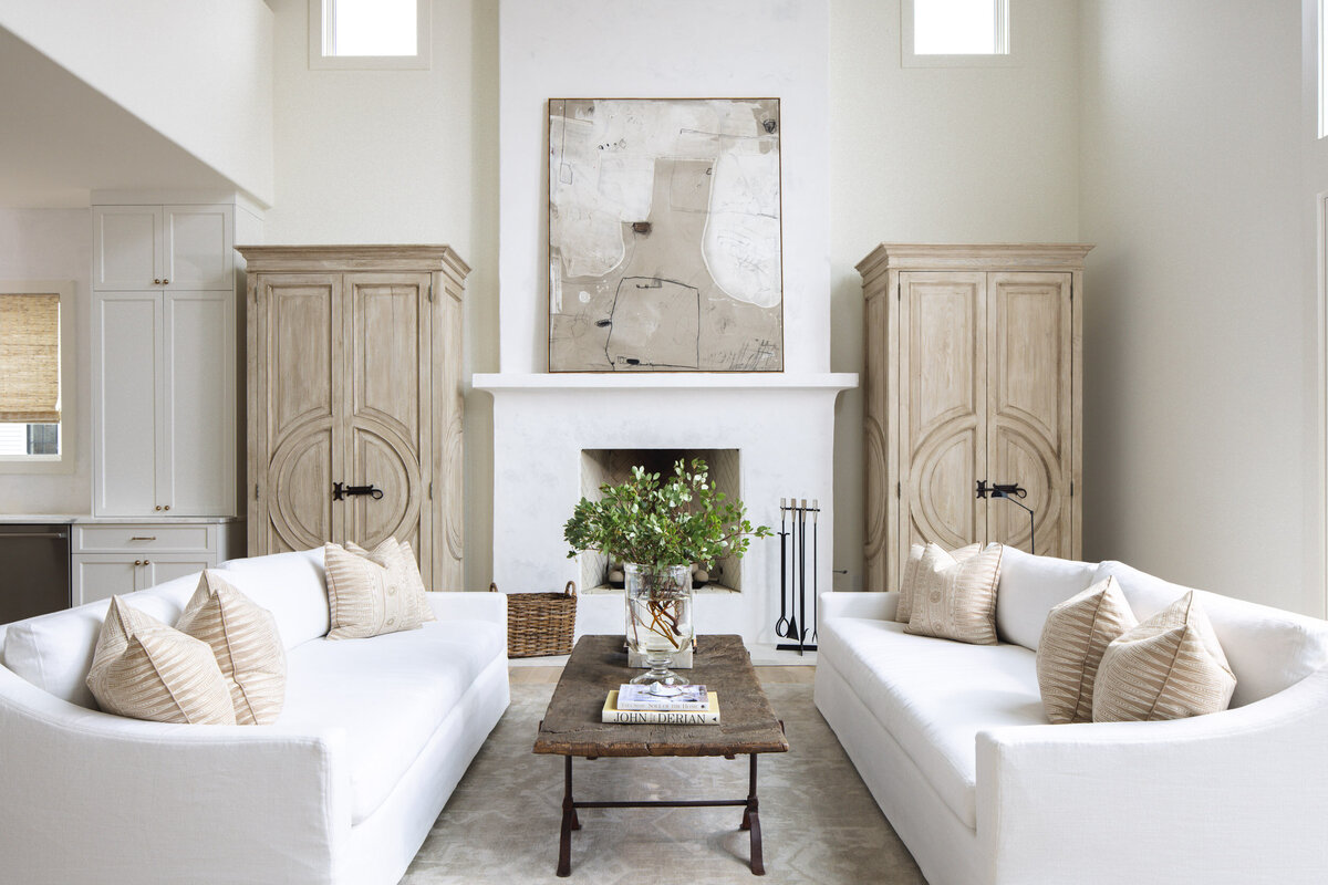 Neutral living room with fireplace, natural wood