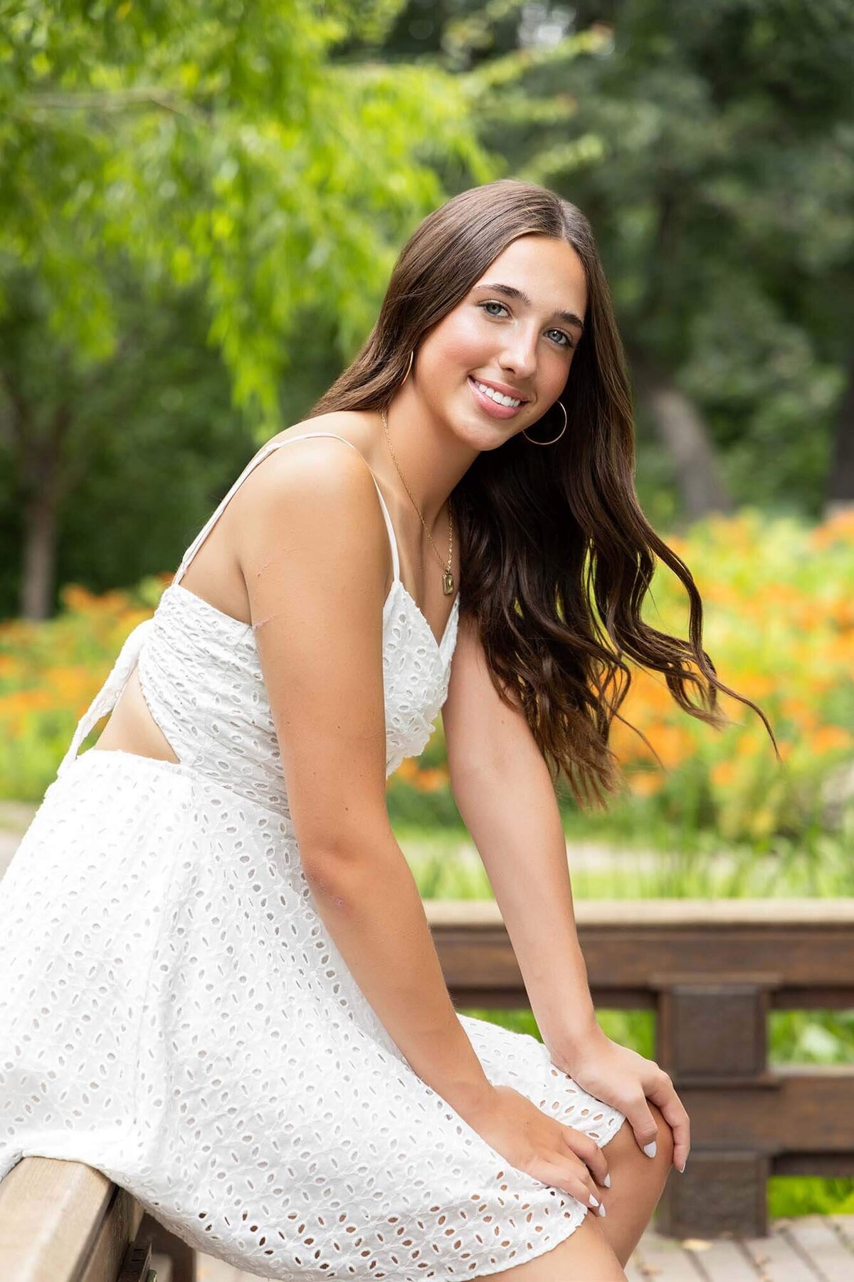 white-dress-in-garden-senior-pictures