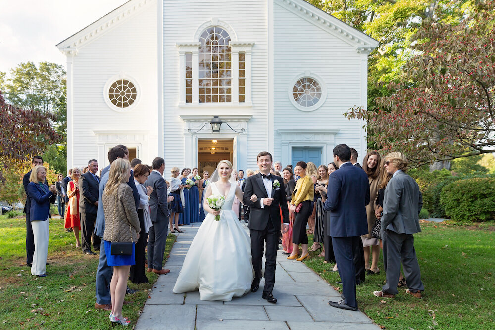 leaving-church-ball-gown-bride-groom