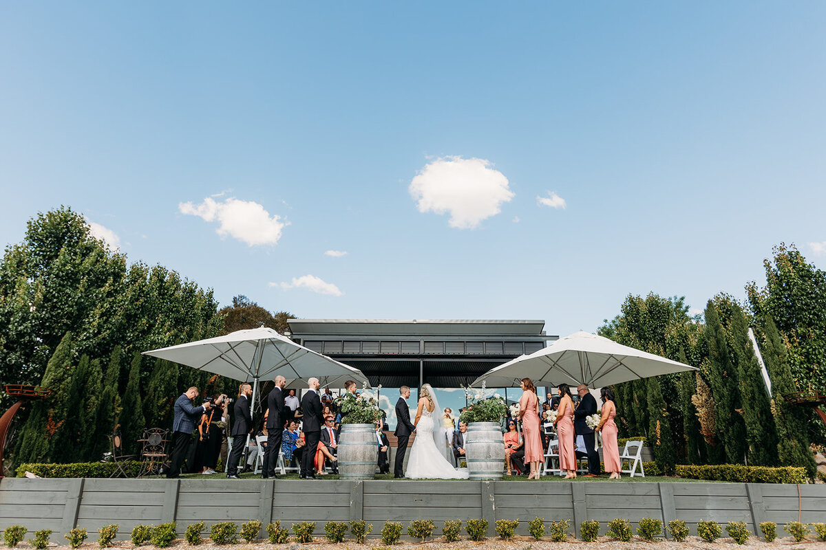 A behind the scenes view of a wedding ceremony at Brindabella Hills Winery