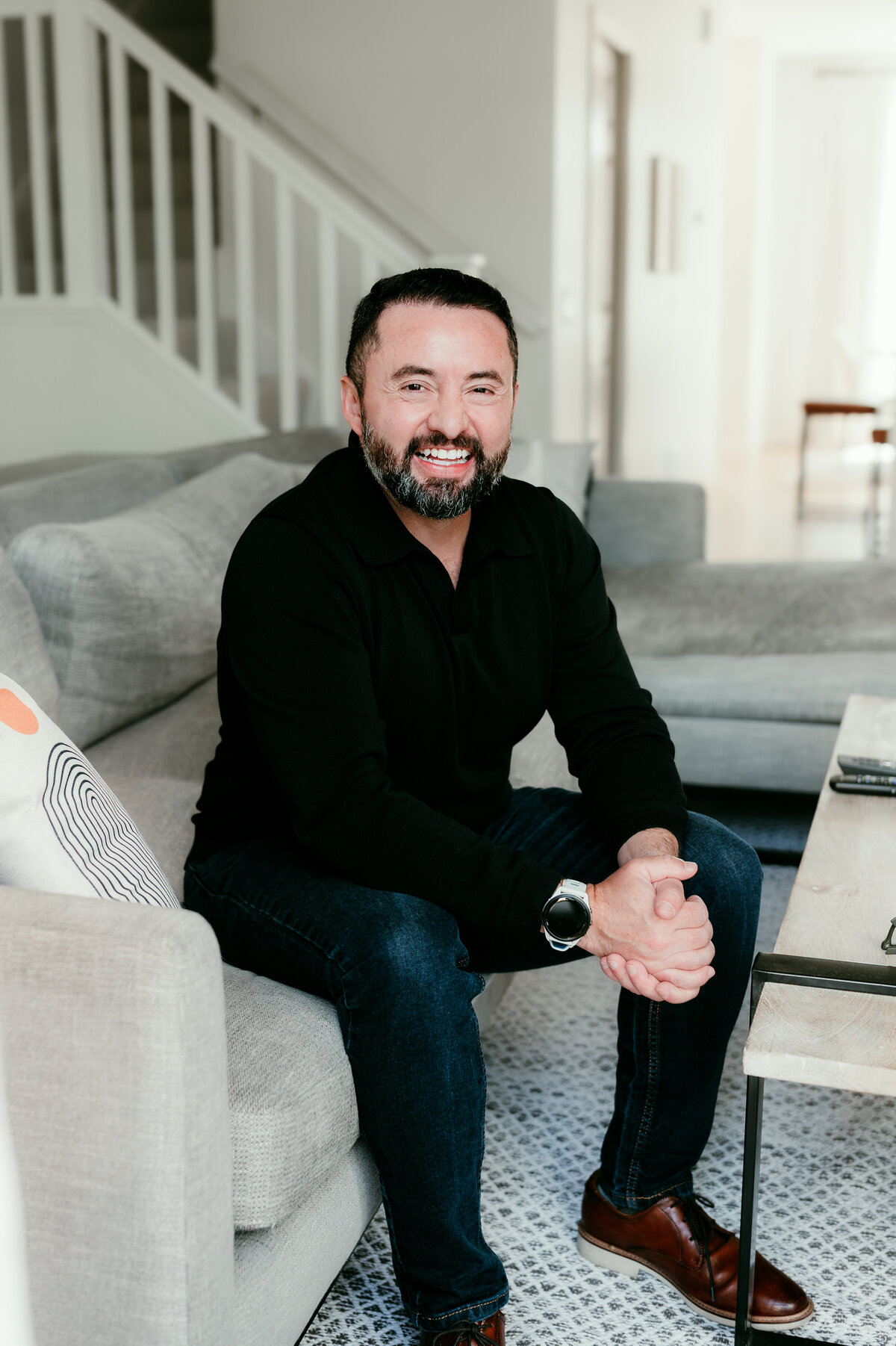 Professional online dating photo of a man dressed smart-casual, smiling naturally for his dating app profile in the Twin Cities.