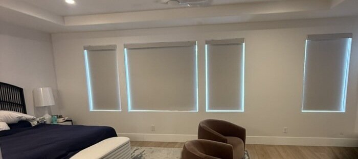 Inside mount roller shades showing light gaps around the edges in a Las Vegas bedroom
