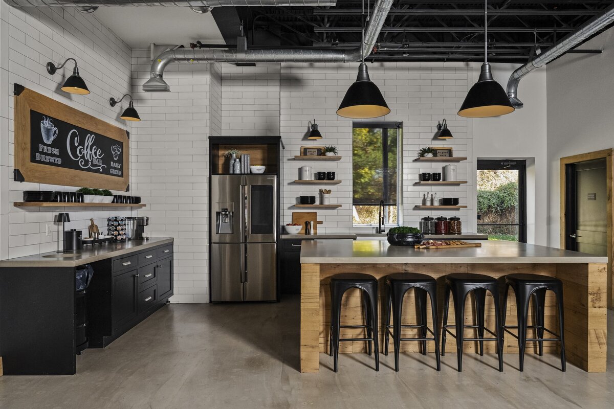 candra lynn interiors old bridge project office kitchen space with large island and floating shelves