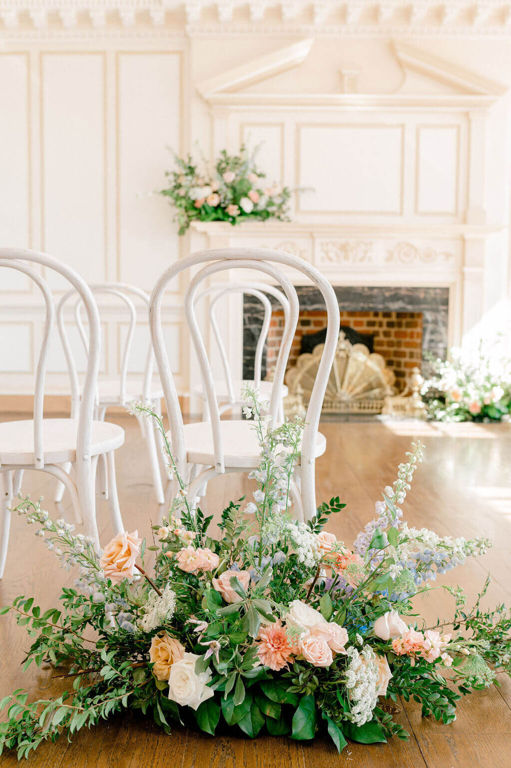 floral meadow behind wedding chair at ceremony site