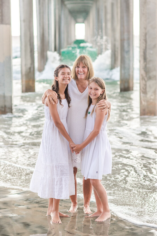 grandmother-and-granddaughters-under-Scripps-Pier-San-Diego
