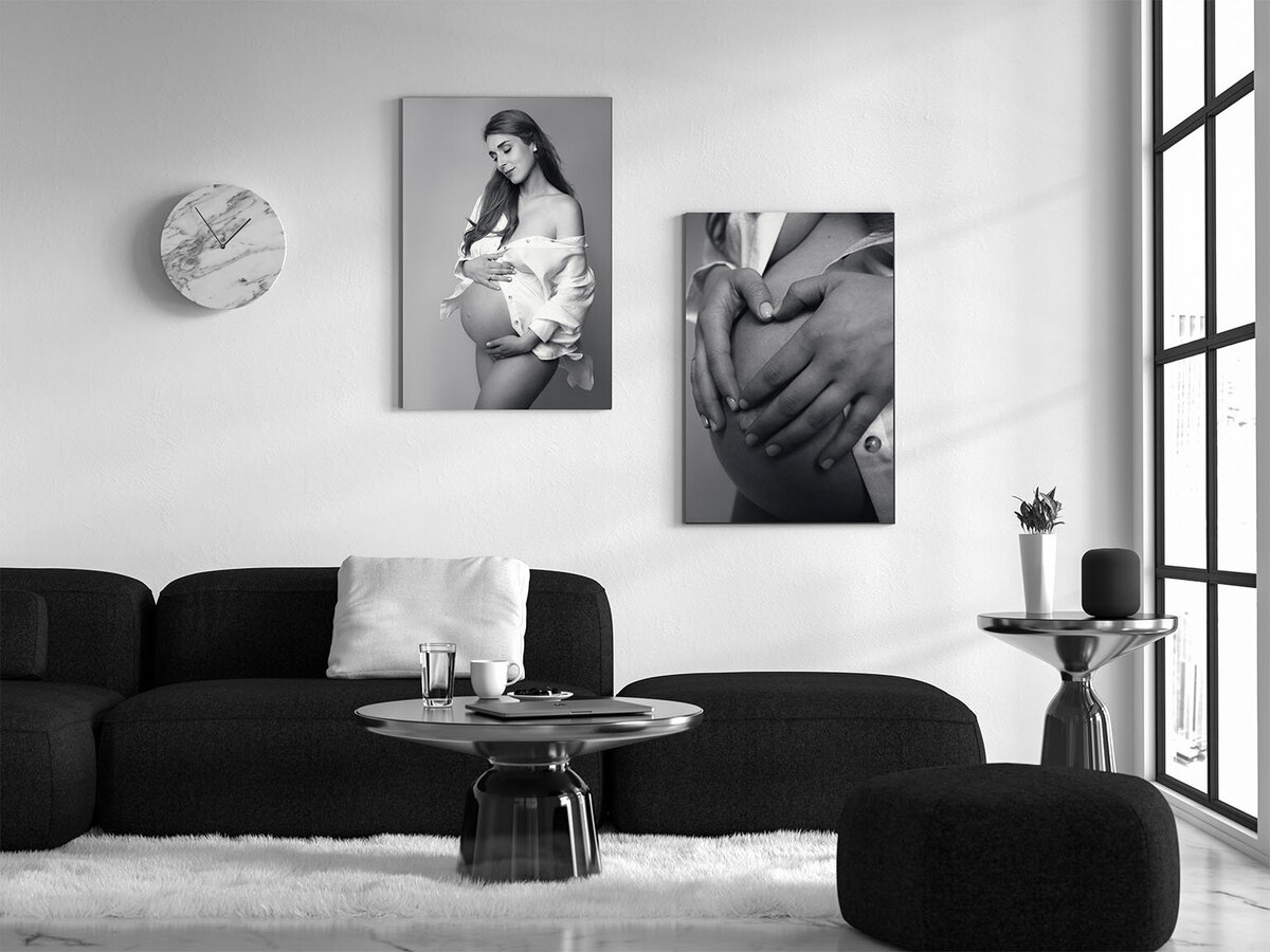 Living room decorated with printed photos of an adorable pregnant woman