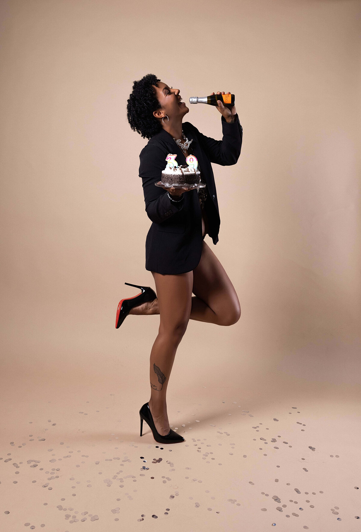 woman celebrating her 39 birthday session with reva davis photography