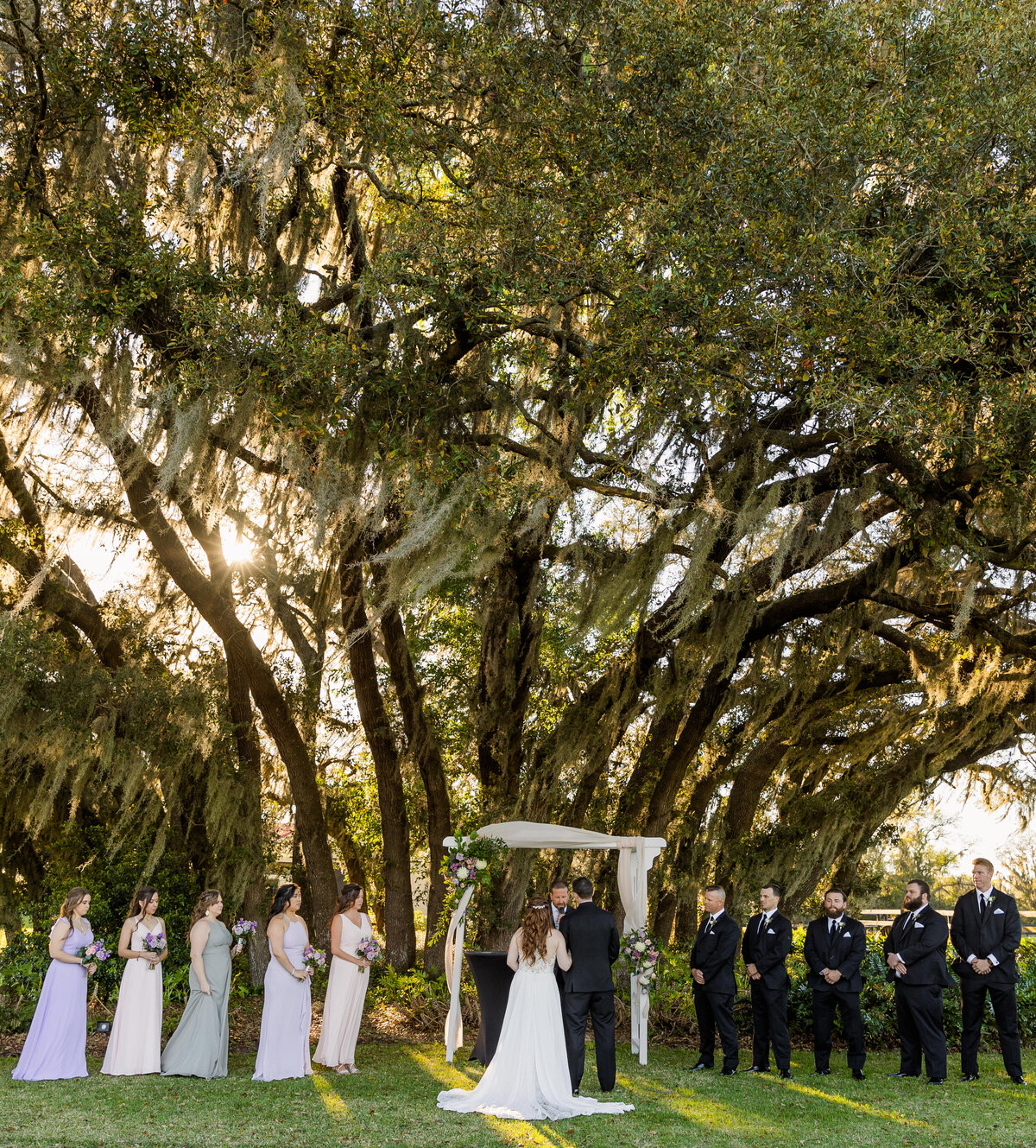 Bride and Groom at ceremony at wedding  Orlando Florida captured by Orlando  Wedding Photographer Blak Marie Photography