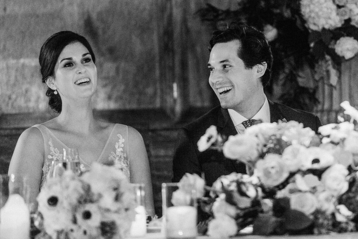 A beautiful black and white photo of a candid moment during a wedding reception at Cafe Brauer in Chicago