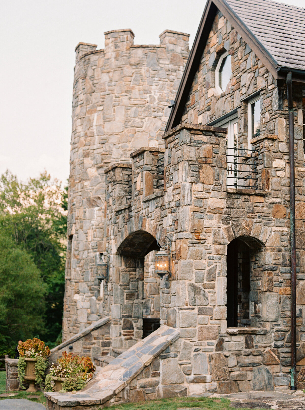 Stone exterior of Castle Ladyhawke wedding venue in Tuckaseegee, North Carolina, featuring rustic architecture and mountain views.