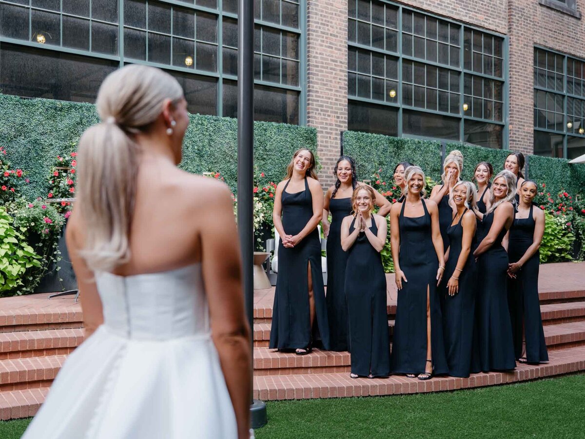 Bride's first look with bridesmaids at The Hotel Indigo in Cleveland