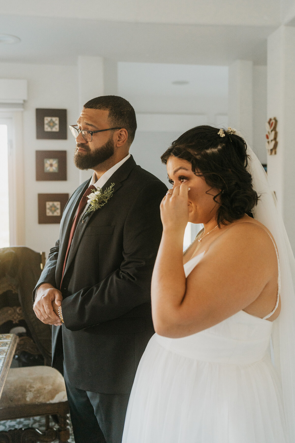 A newlywed couple standing together 