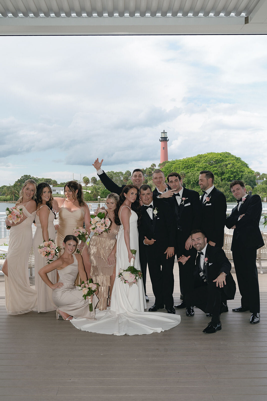 Bride and groom with bridesmaids and ushers at an outdoor wedding ceremony