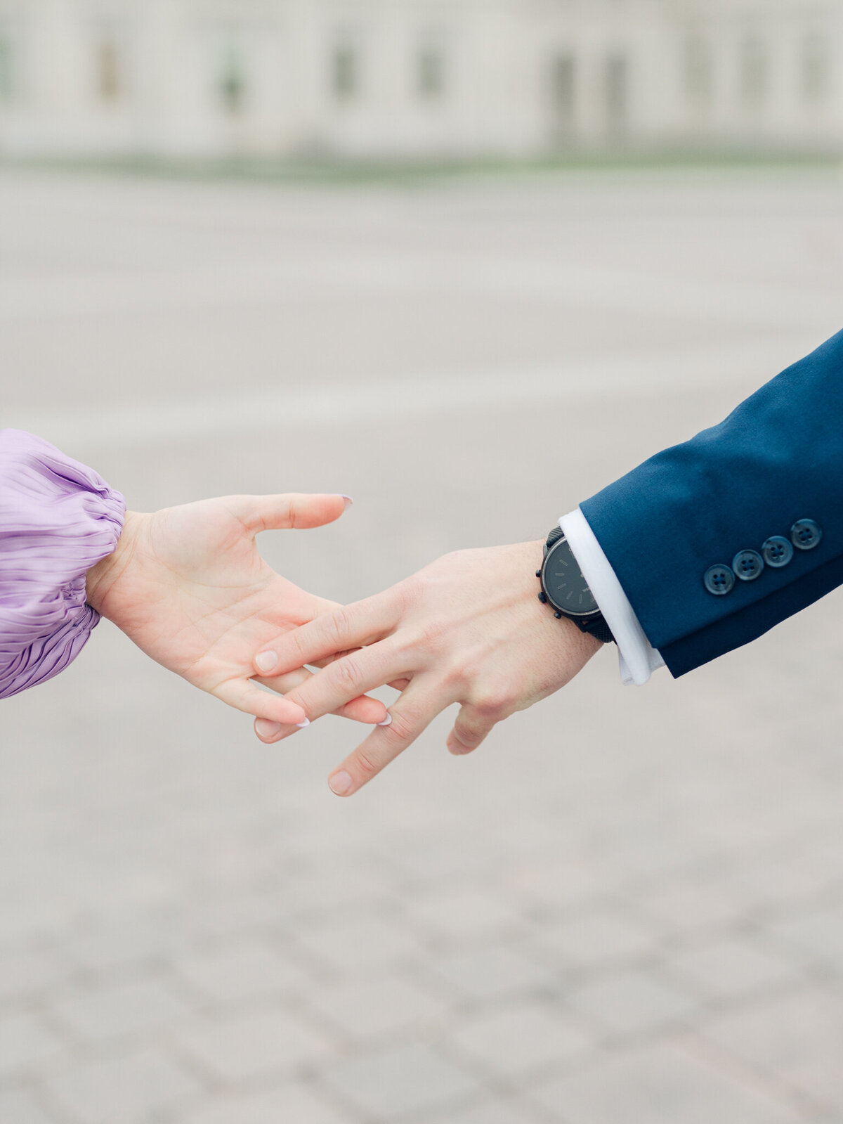 Couple holding hands taken by washington dc wedding photographers, Nicole Simensky