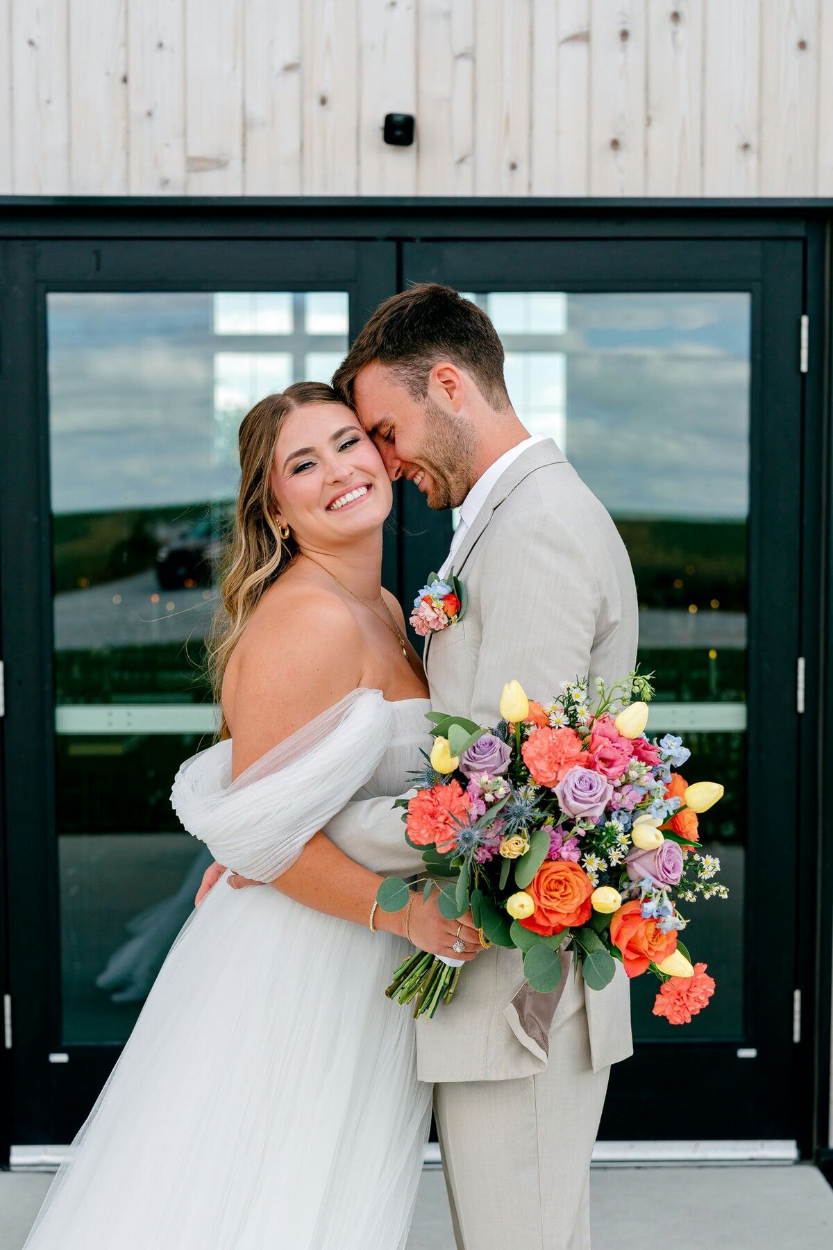 groom-kissing-bride-portrait