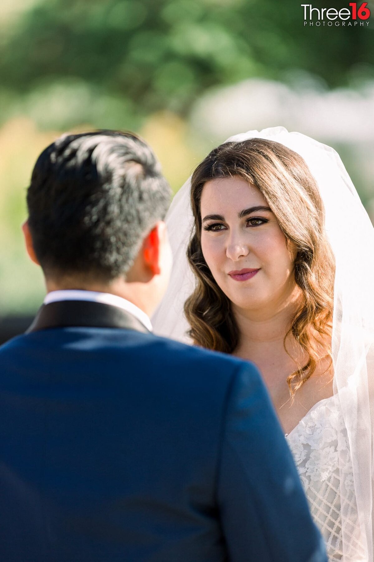 Bride lovingly gazes at her Groom during the wedding ceremony