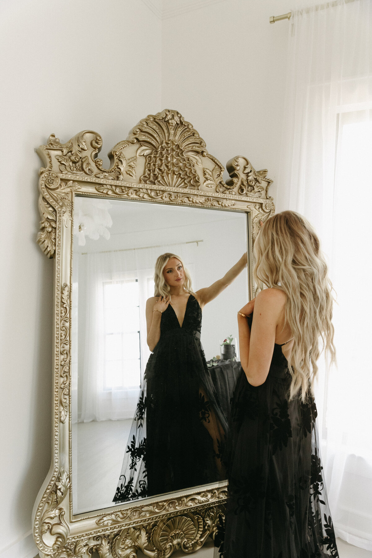 creative photoshoot with bride in a black wedding dress