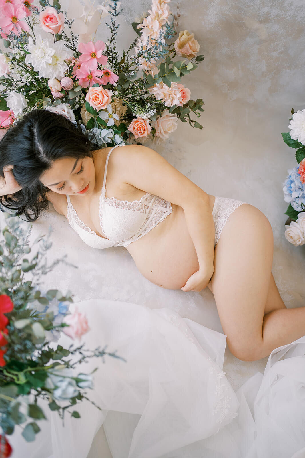 Capture the elegance of maternity with a mum adorned in a stunning maternity gown at Gold Coast's Kwila Lodge