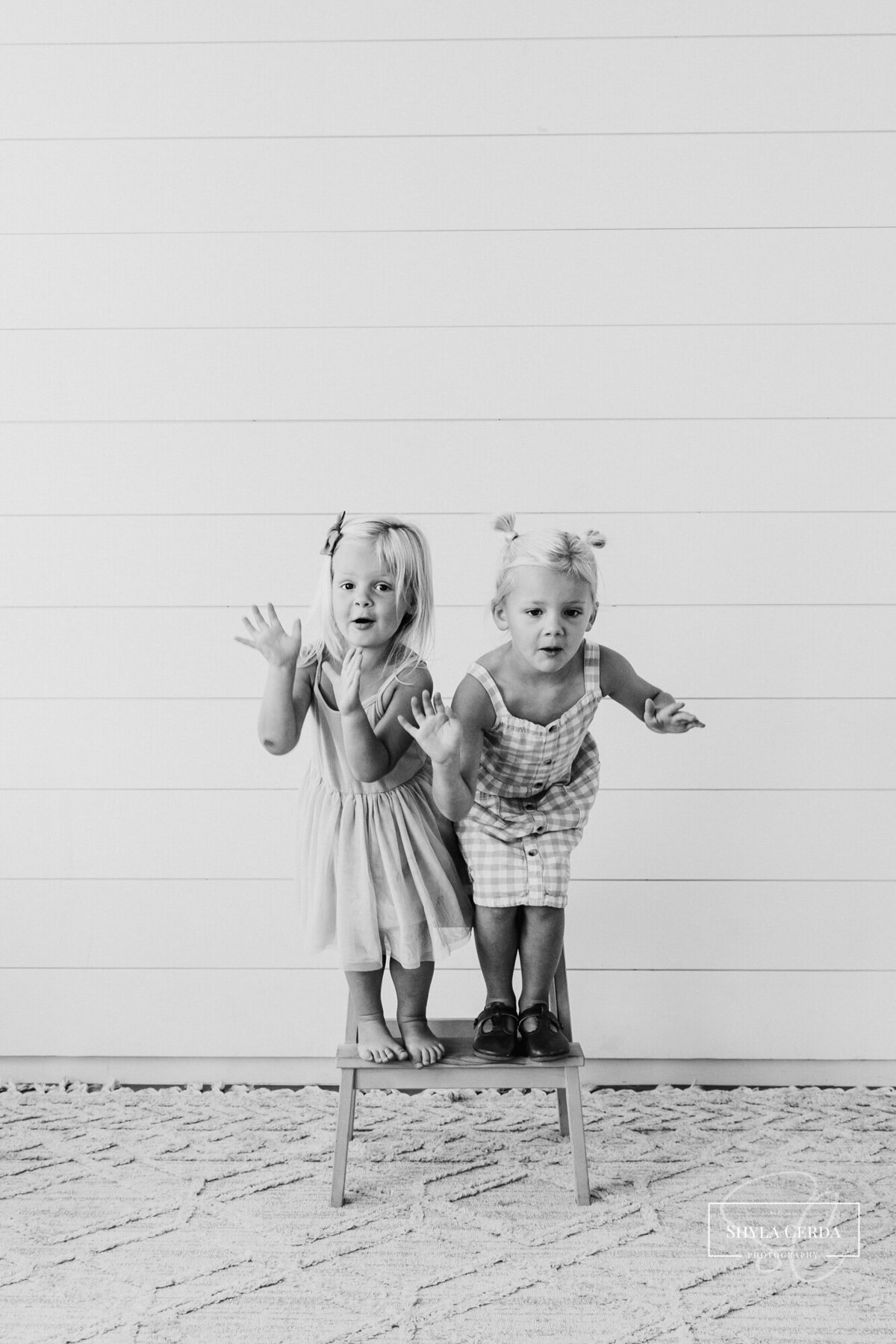 Two sisters playing during studio session