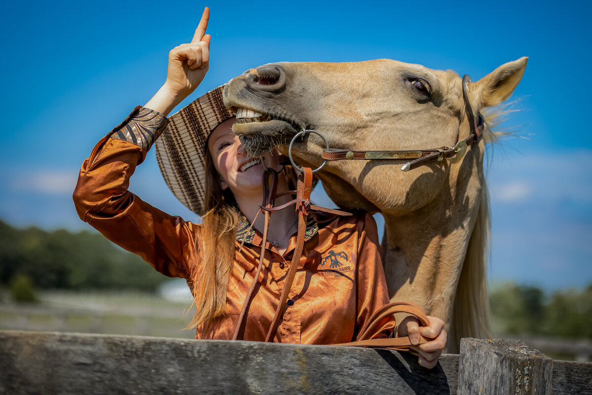 Smile girl in high school and horse is smiling