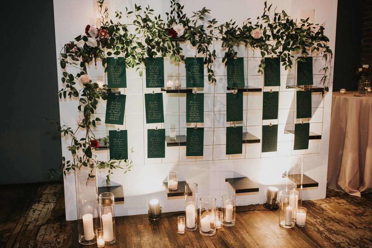 seating chart decorated in greenery