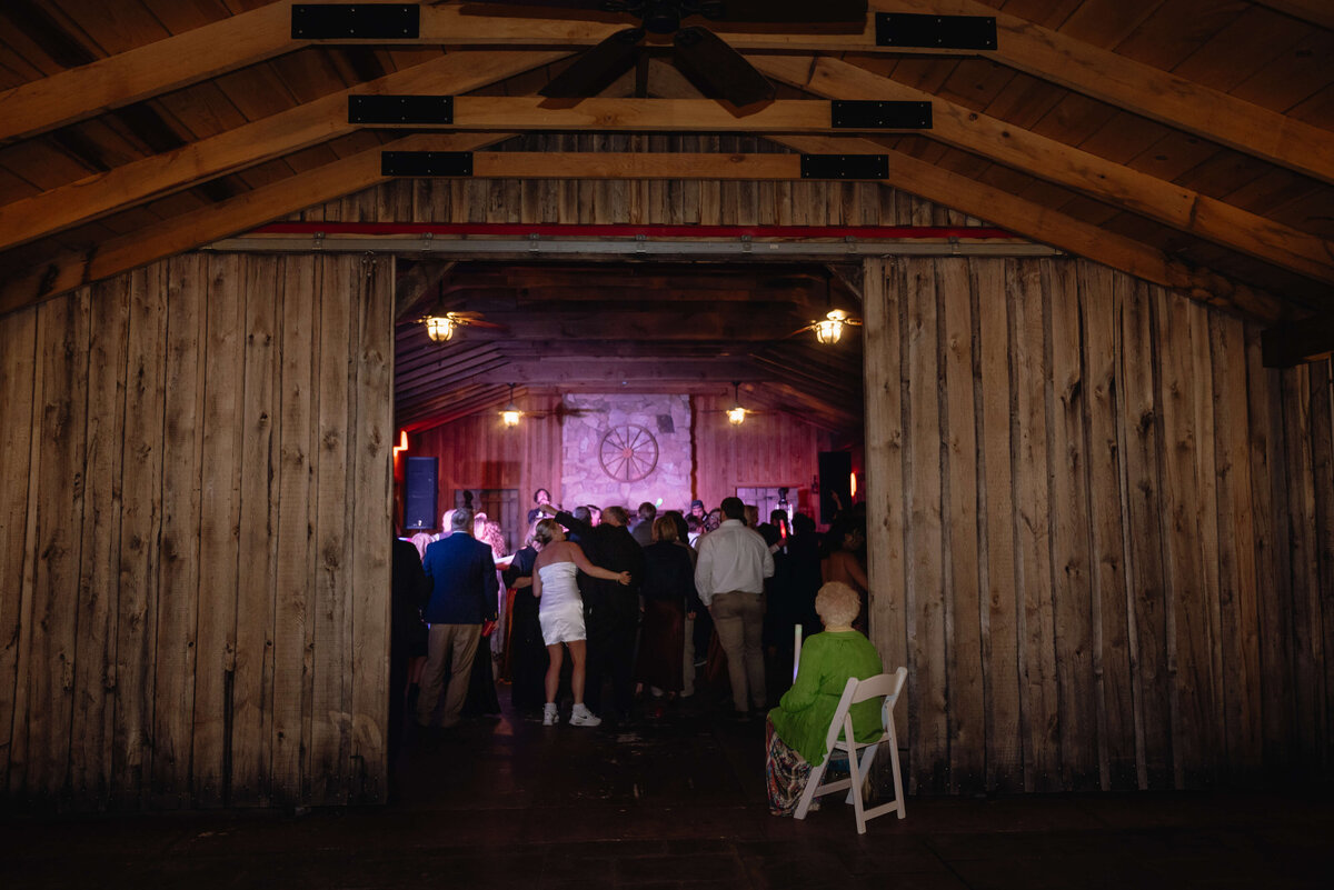 bride dancing with her guests in a barn wedding venue in Virginia