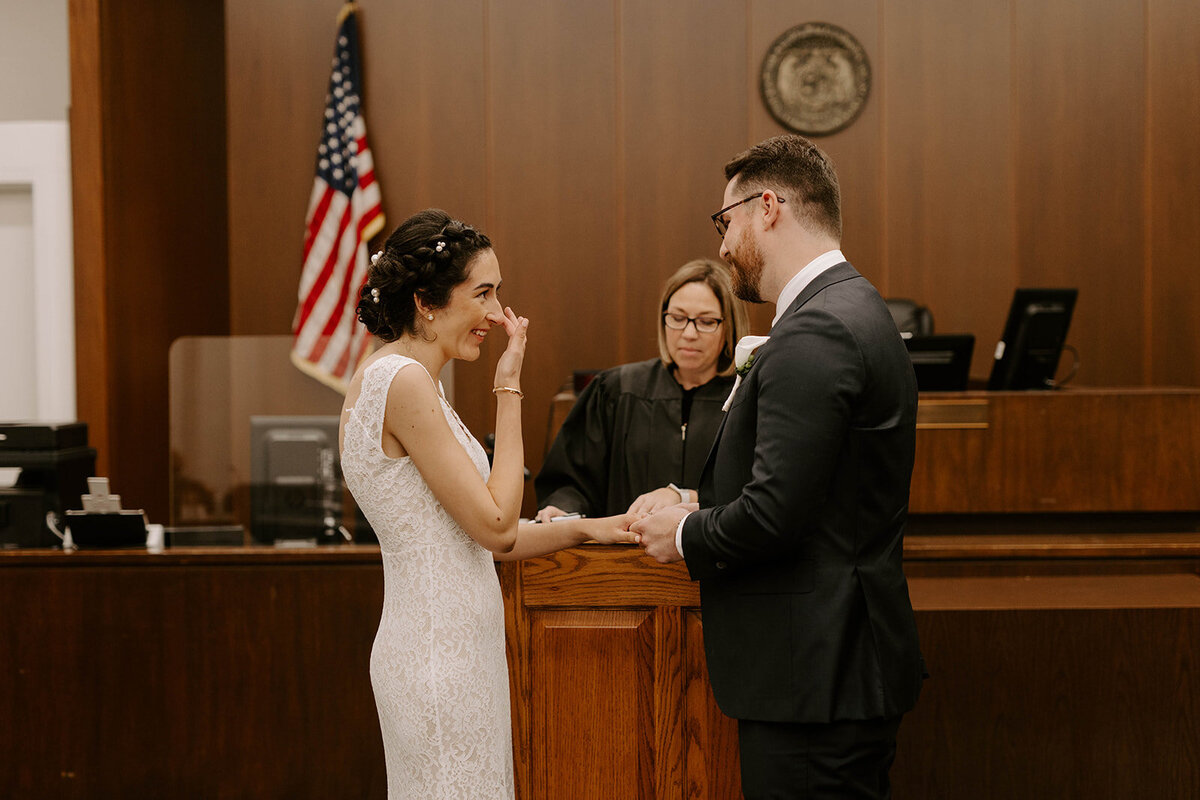 Couple getting married with judge at Clayton Courthouse