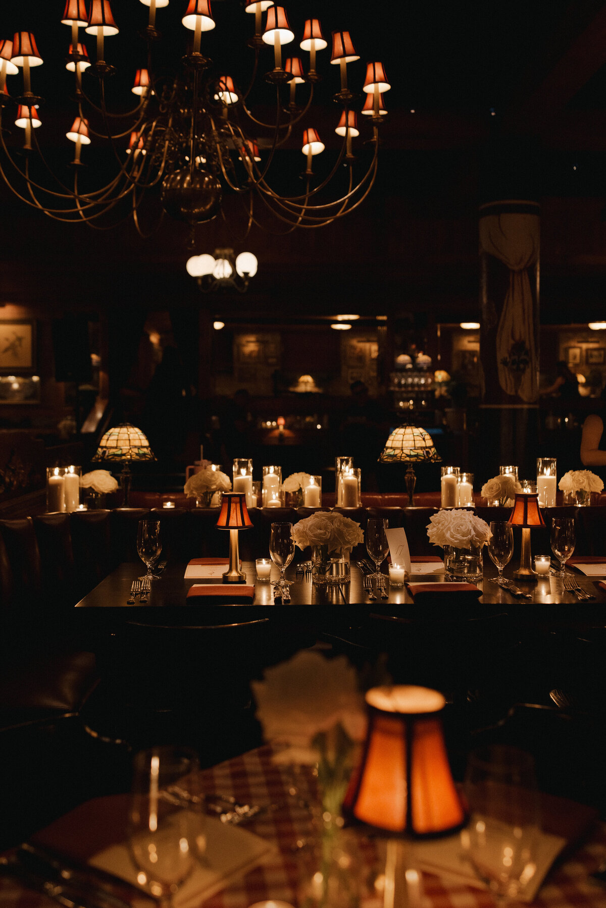 Film photography captures editorial ceremony elegance at Old Post Office Chicago with Lauren Alatriste's fashion forward approach, showcasing architectural beauty while maintaining sophisticated magazine-worthy imagery and authentic wedding emotion.