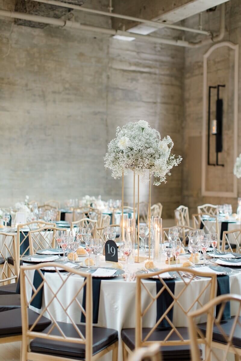 baby's breath centerpieces at the switch house wedding reception
