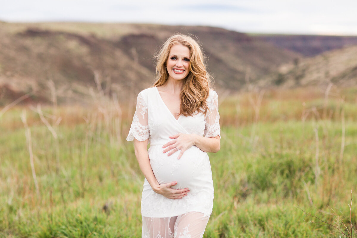 maternity photo with mom to be holding bump