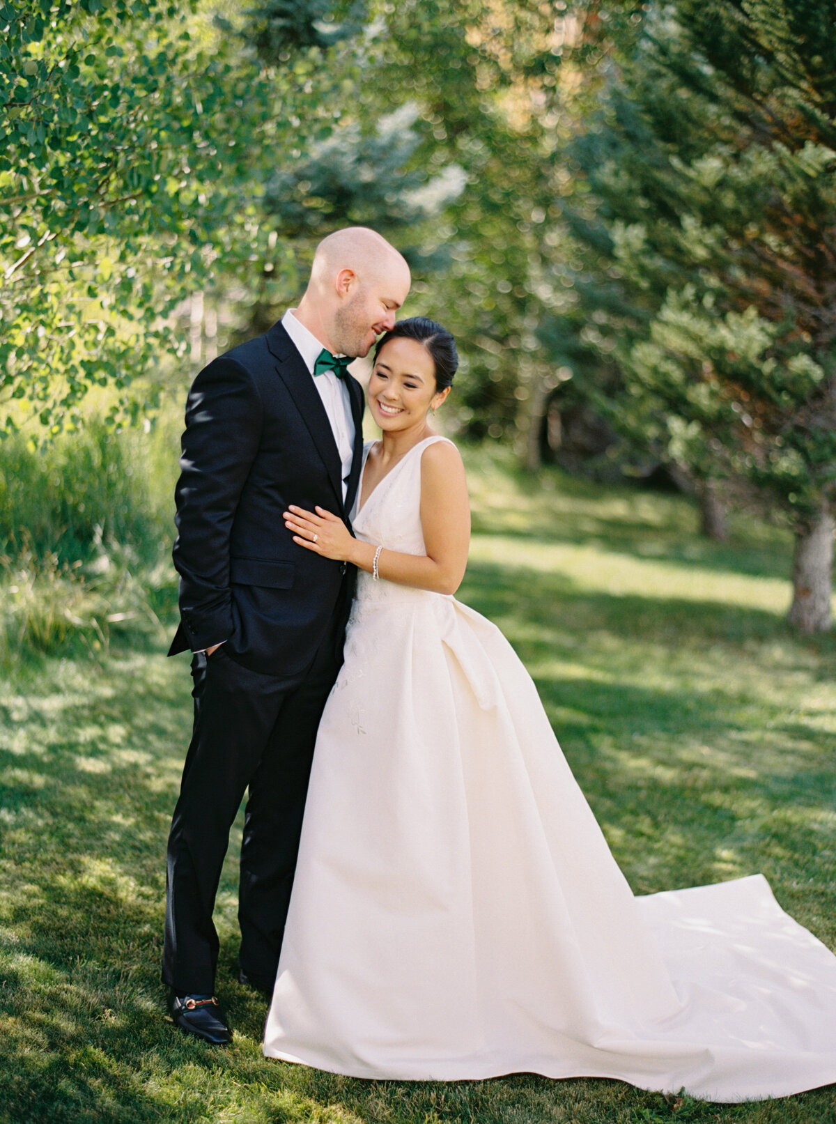 Couple embracing at Brush Creek Ranch wedding