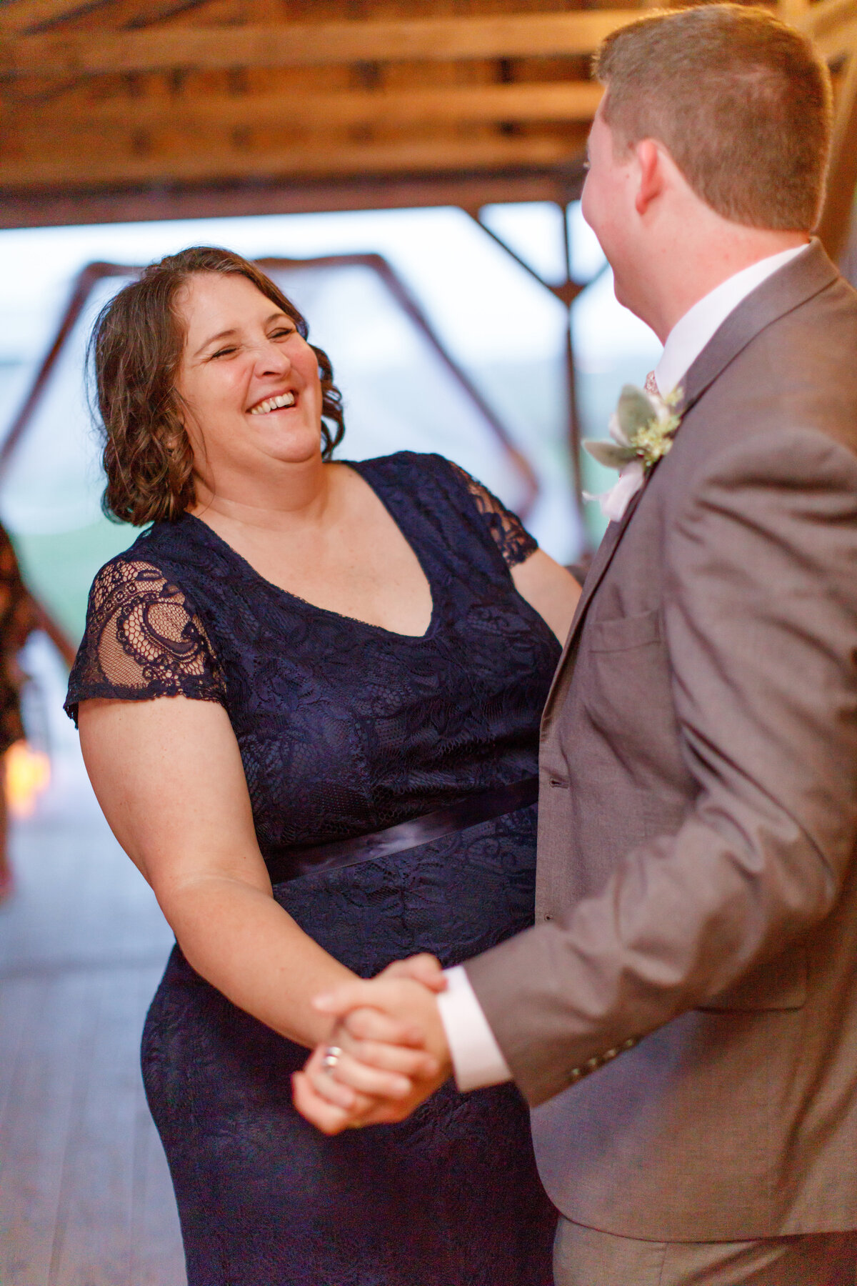 mother of the groom dance  by New Braunfels wedding photographer Firefly Photography